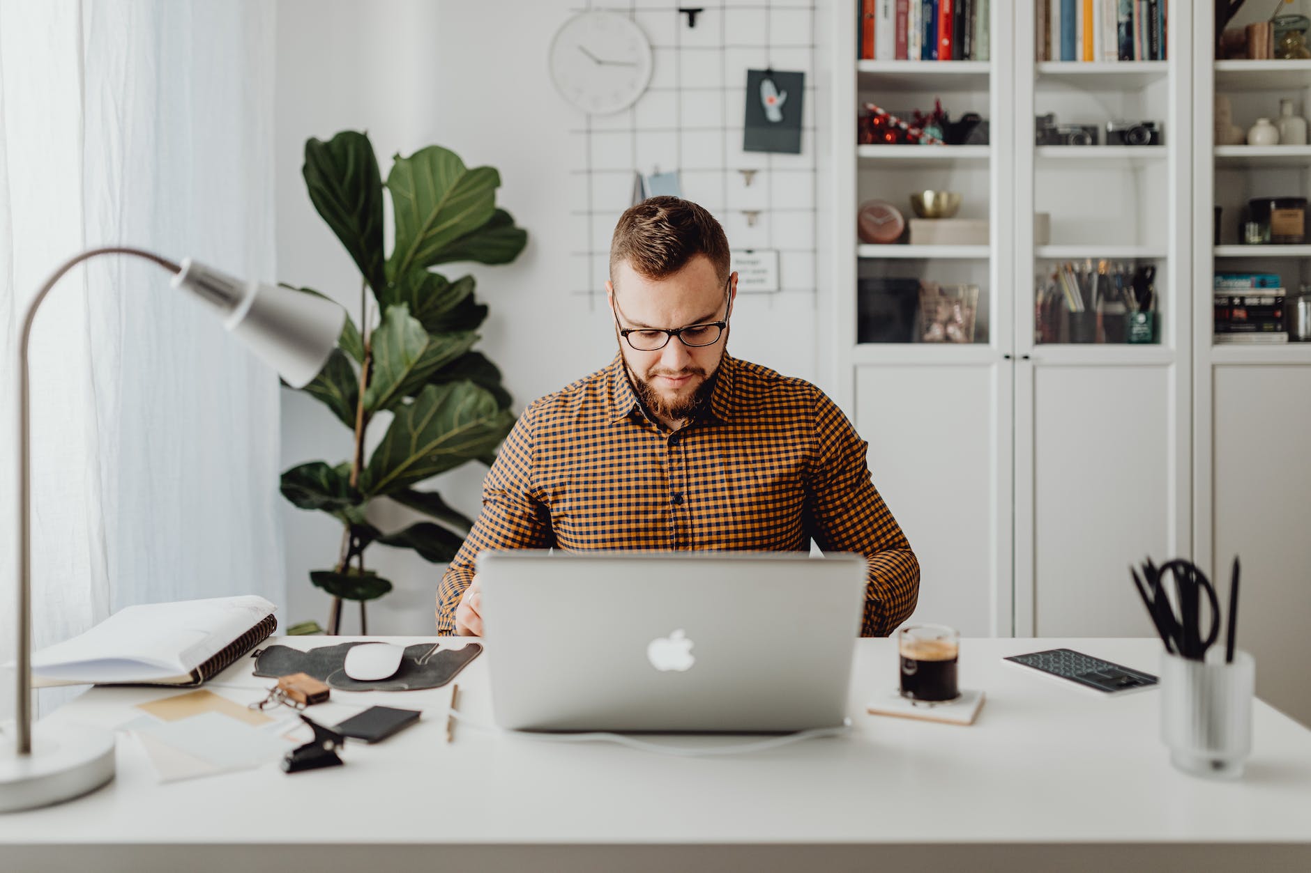 man working from home on laptop